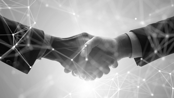 Two people shaking hands